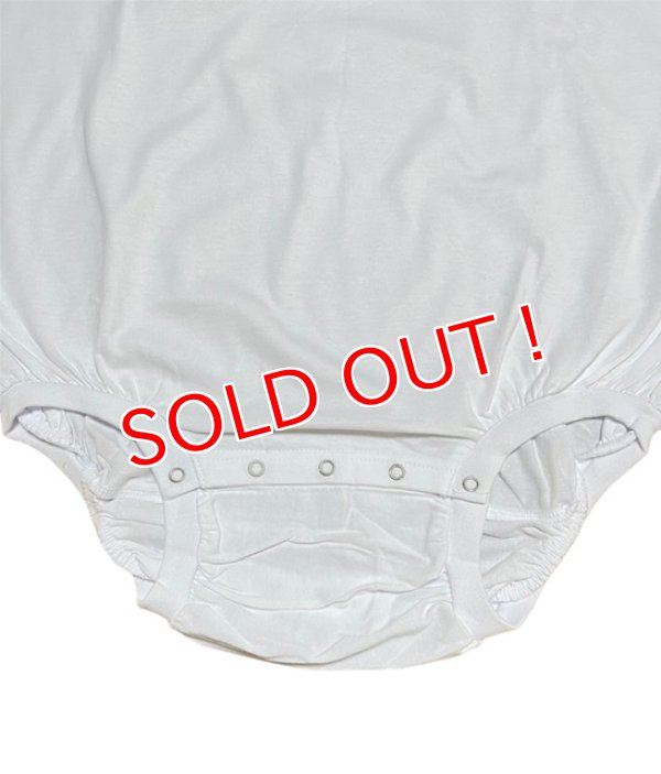 股下に金属スナップボタン